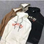 Wholesale Men's Casual Letter Print Drawstring Long Sleeve Kangaroo Pocket Hoodie preview