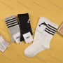 Wholesale Men's Breathable Cushioned Striped Cartoon Print Crew Socks preview